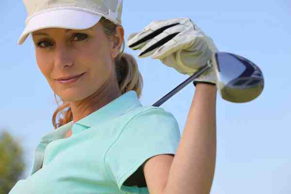 A portrait of a female golfer.